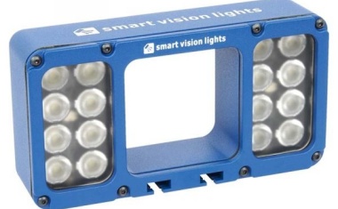 Compact light source with integrated camera mount
