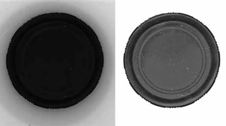 Images of black plastic caps illuminated with dome lights. The image on the...