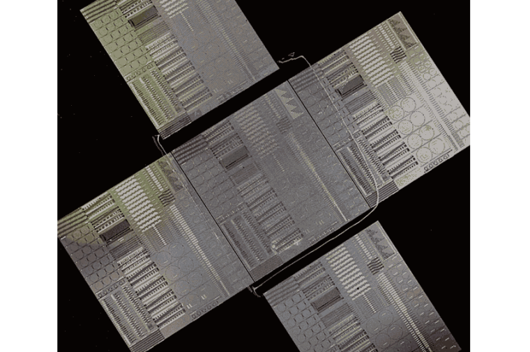An AlGaAs-on-insulator integrated quantum photonic chip with test components...