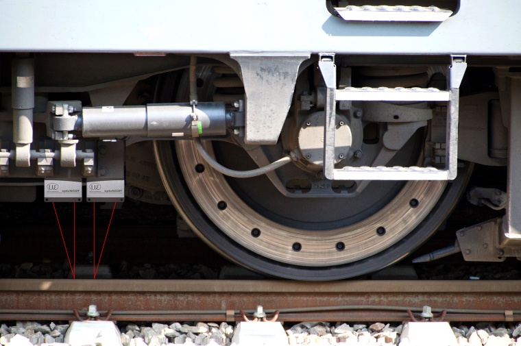 Special measuring cars are used to inspect high-speed train tracks. Laser...