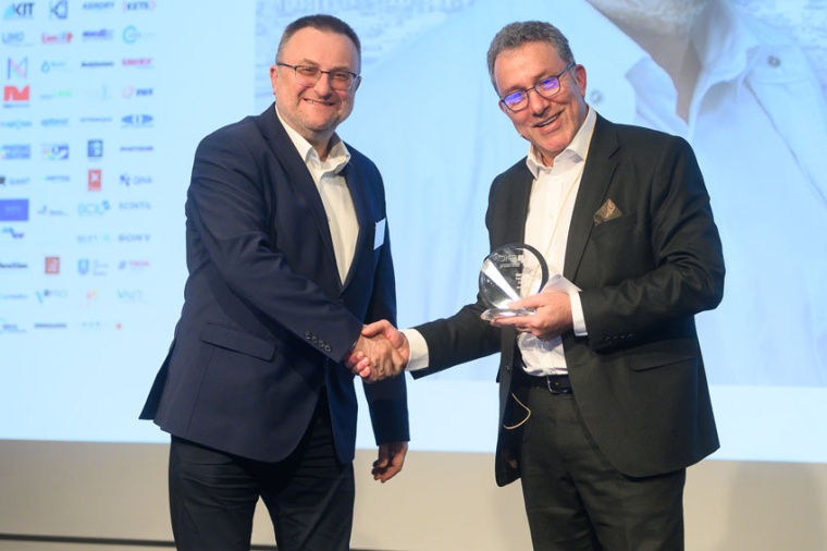 Basil Garabet, president of EPIC, delivers the EPIC Lifetime Achievement to...