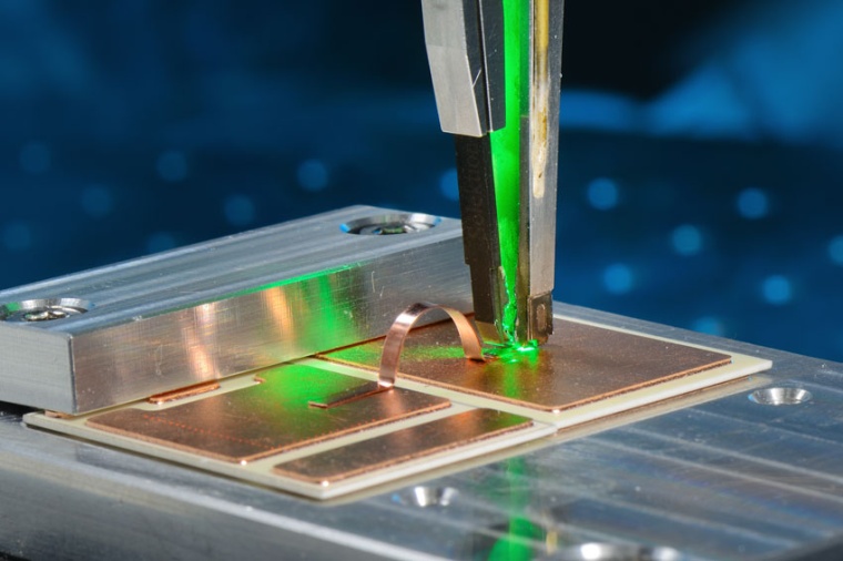 Laser beam welding of metal-ceramic substrates with green laser radiation...