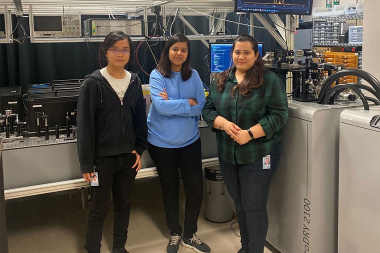 Kai Sum Chan, Priya Vaish, and Samridhi Gambhir (l–r), working on the...