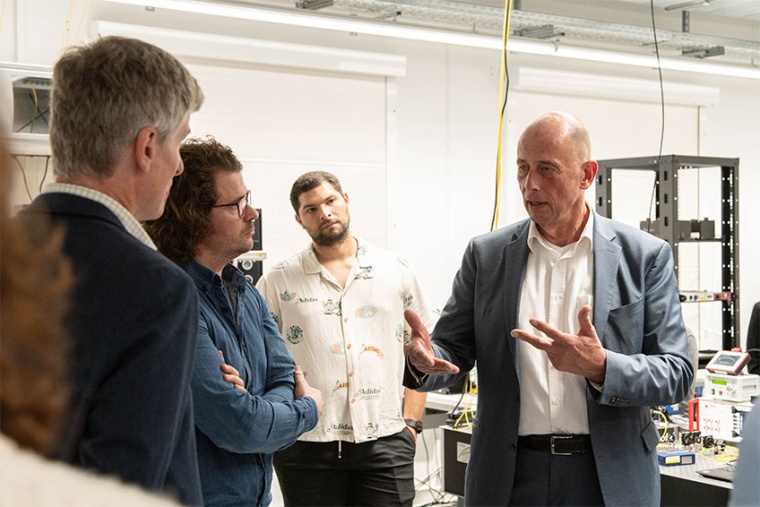 Science Minister Wolfgang Tiefensee in conversation with the researchers in a...