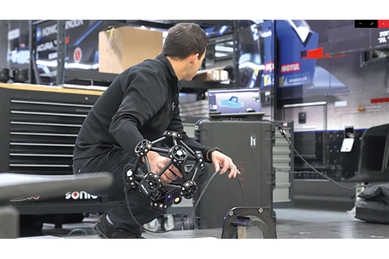 WTR Andretti engineer scanning a special part with the Creaform Metrascan 3D....