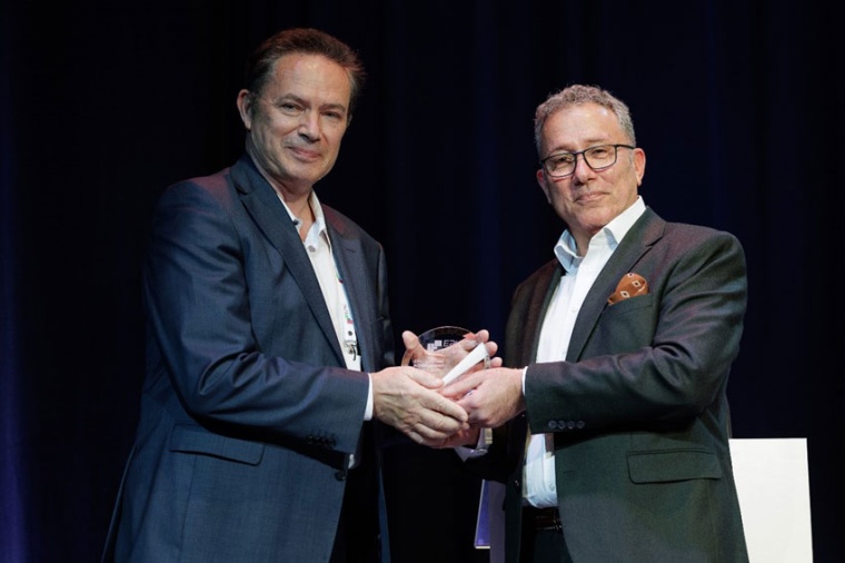 EPIC president Basil Garabet (r) delivers the EPIC Lifetime Achievement Award...