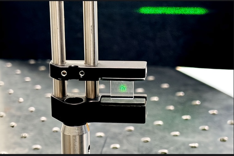 Improving the integrated uniformity of laser lines generated by double sided...