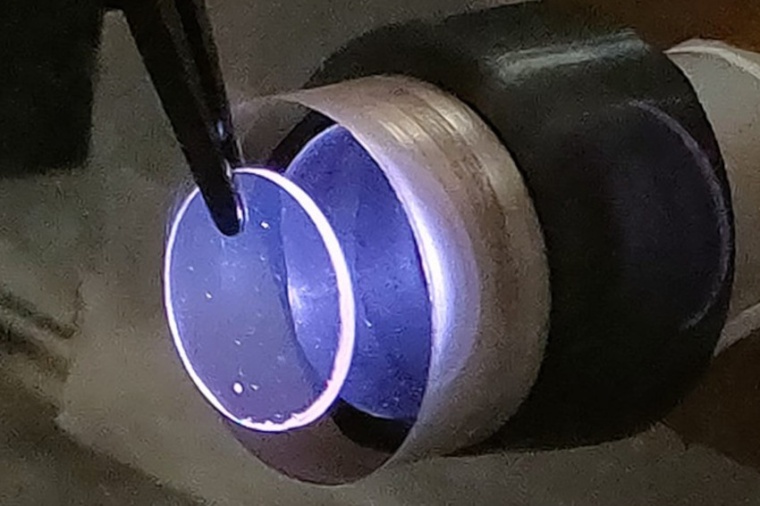 A crystal used in the study charges under UV light. The process could be used...