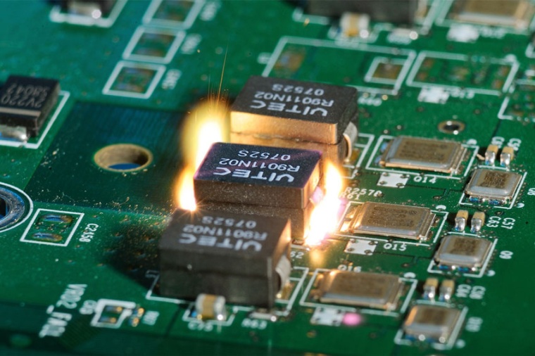 Non-contact exposure and desoldering of circuit board components using laser...