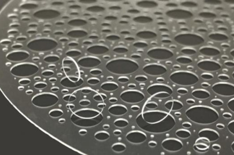 Fused silica wafer with thickness of 350 µm with high-quality glass vias of...