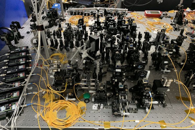 Experimental setup of a new quantum transmission protocol that allows a higher...