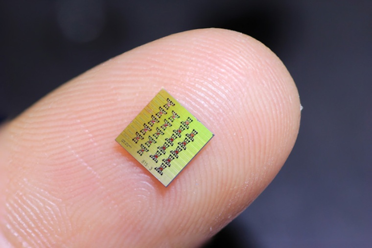 Prototype of an electrically driven optical isolator-on-a-chip that transmits...