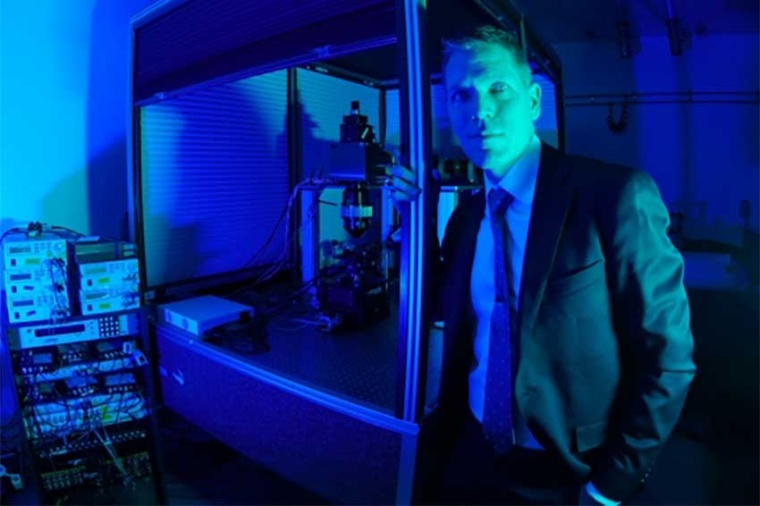 Scientist Spencer Smith in front of his new Diesel2p-microscope for detailed...