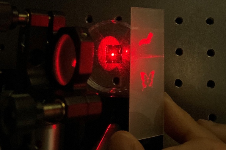 A new metasurface-based device produces holographic images that depend on the...