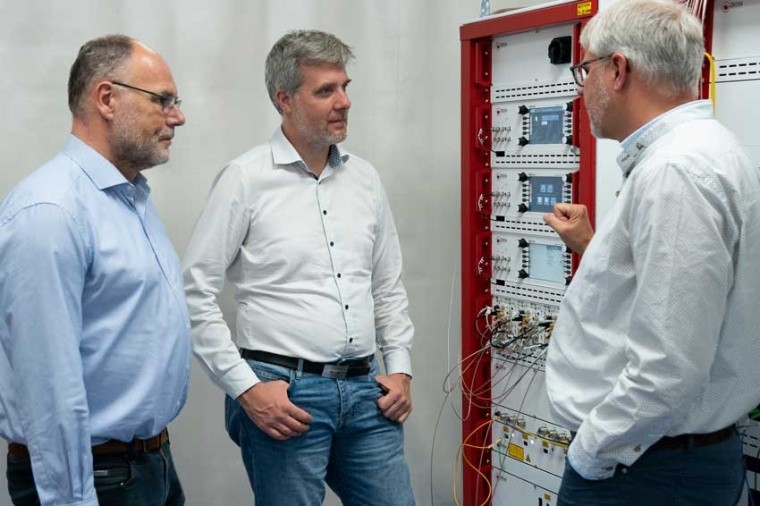 Dieter Janecek (center) in conversation with Wilhelm Kaenders (right) and...