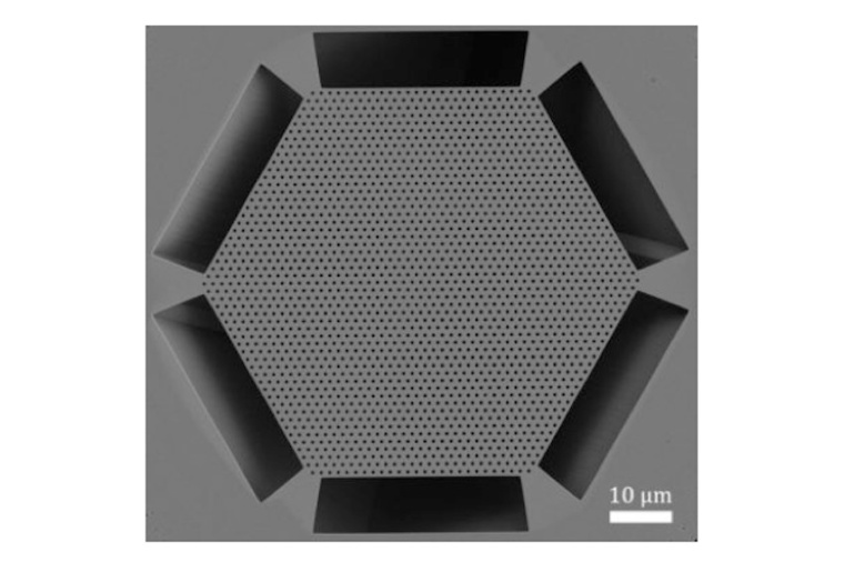 A scanning electron micrograph of the new surface emitting laser. The hexagonal...