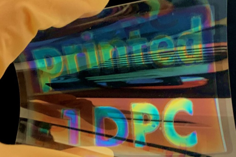 Colored mirror layer printed onto a foil. Inkjet printing allows for...