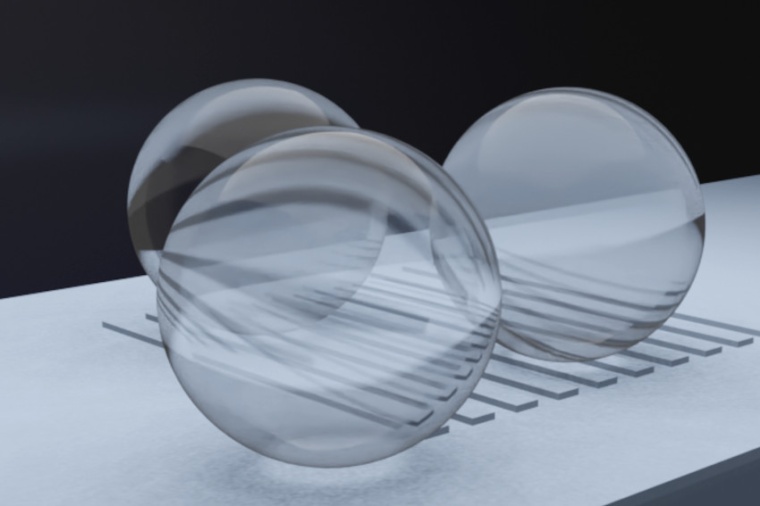 Microspheres placed on a specimen in an interference microscope setup enable...