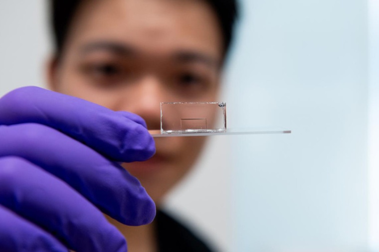 A glass crystal just a few atoms thick can trap and carry light. The material...