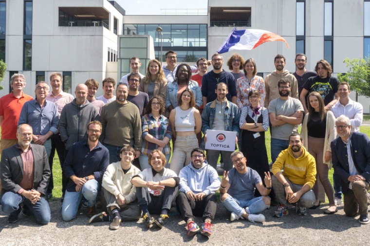 Toptica Photonics SAS employees in front of their premises located in Pessac,...