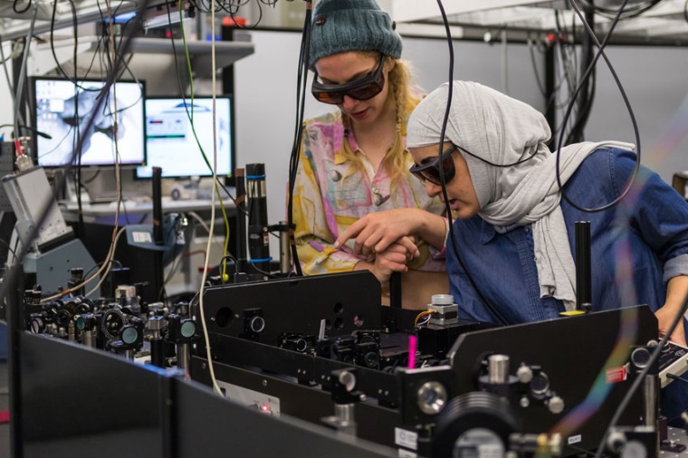 Researchers in a lab of the Photon Science Institute at the University of...