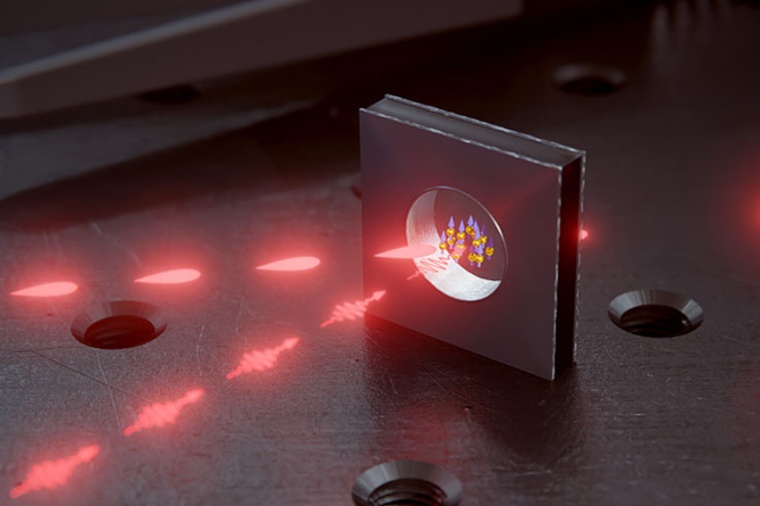 Light pulses can be stored and retrieved in the glass cell, which is filled...