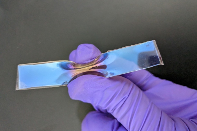 Sample exhibiting colour change from blue to yellow on bending, by virtue of...