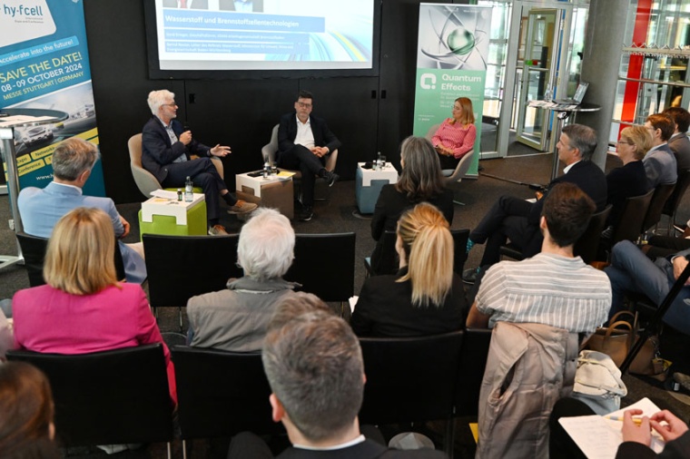 In discussion panels the participants talked about the topics of quantum...