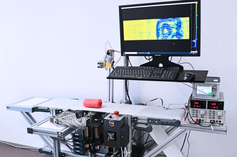Unique THz line scanner with in-house fabricated THz detectors - as a...