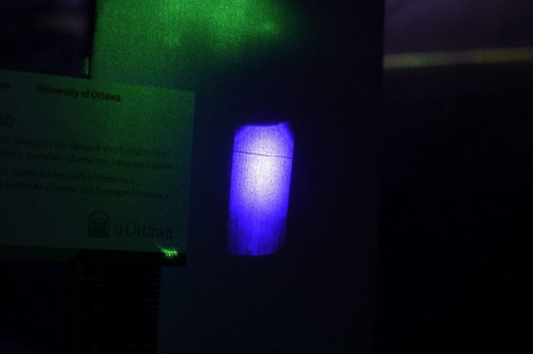 A laser beam can sometimes act like a solid object and cast a shadow that is...